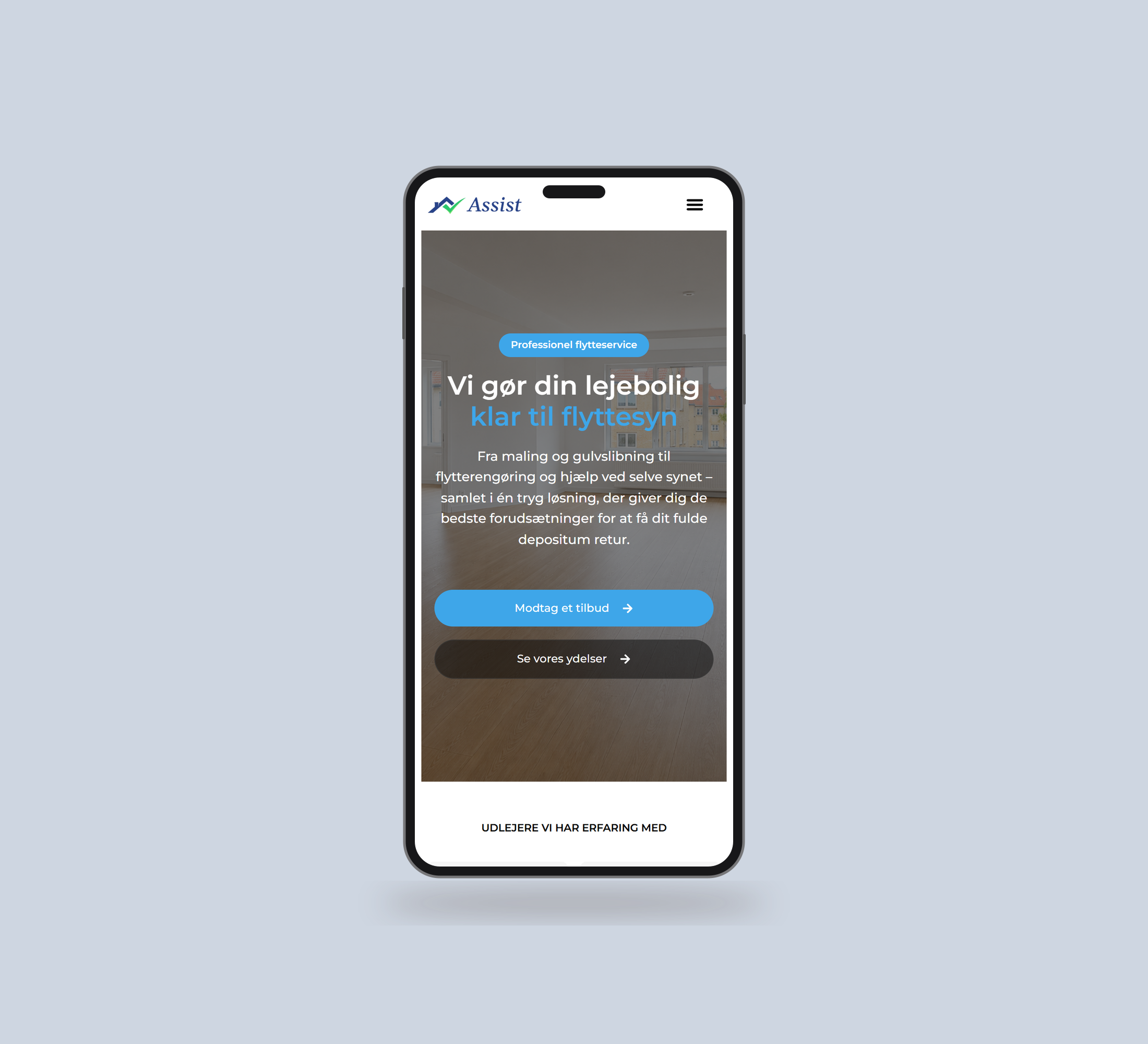 Assist You: forside vist lige forfra på mobil på en ensfarvet studiobaggrund.
