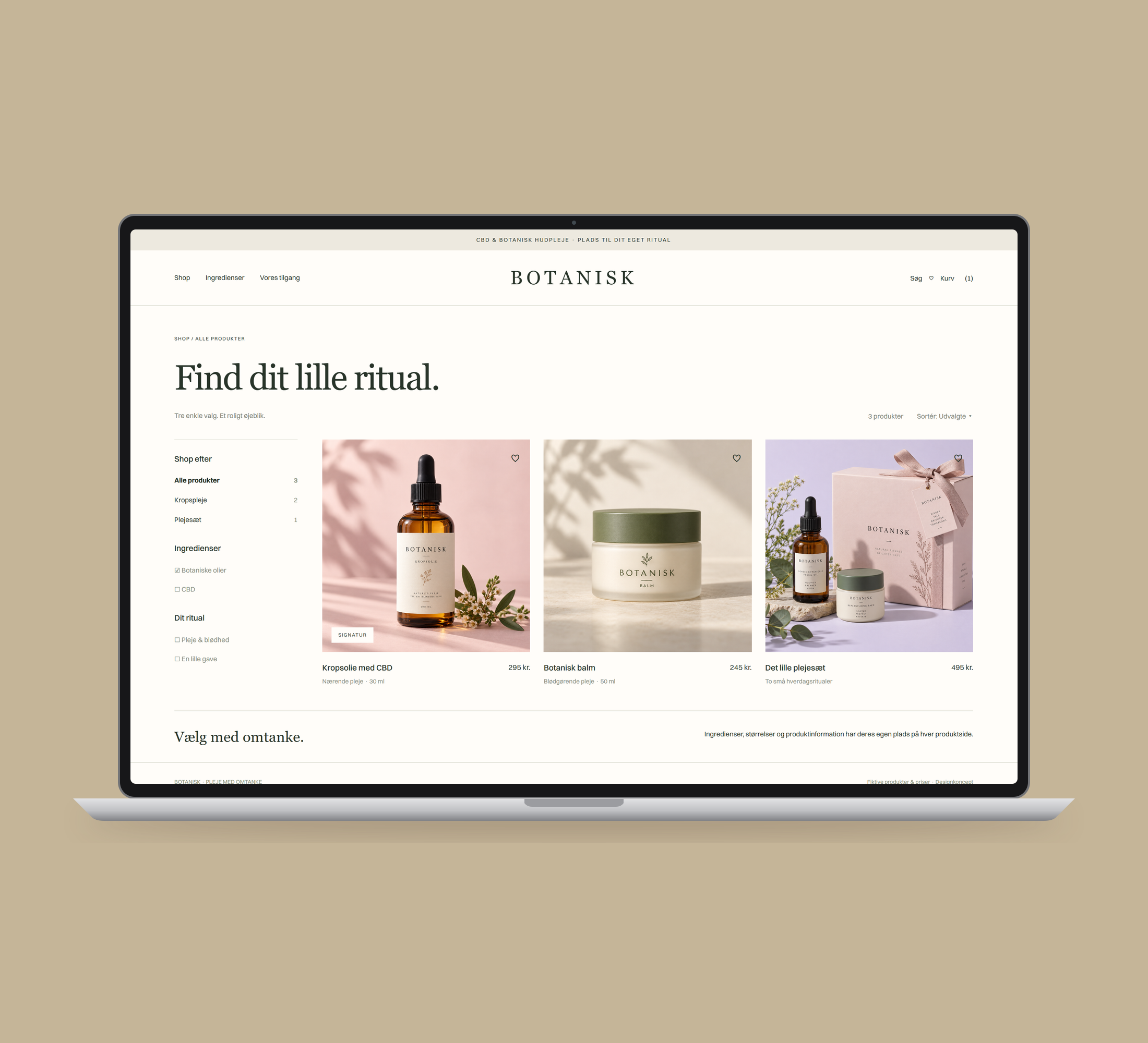Botanisk: kollektion vist lige forfra på laptop på en ensfarvet studiobaggrund.