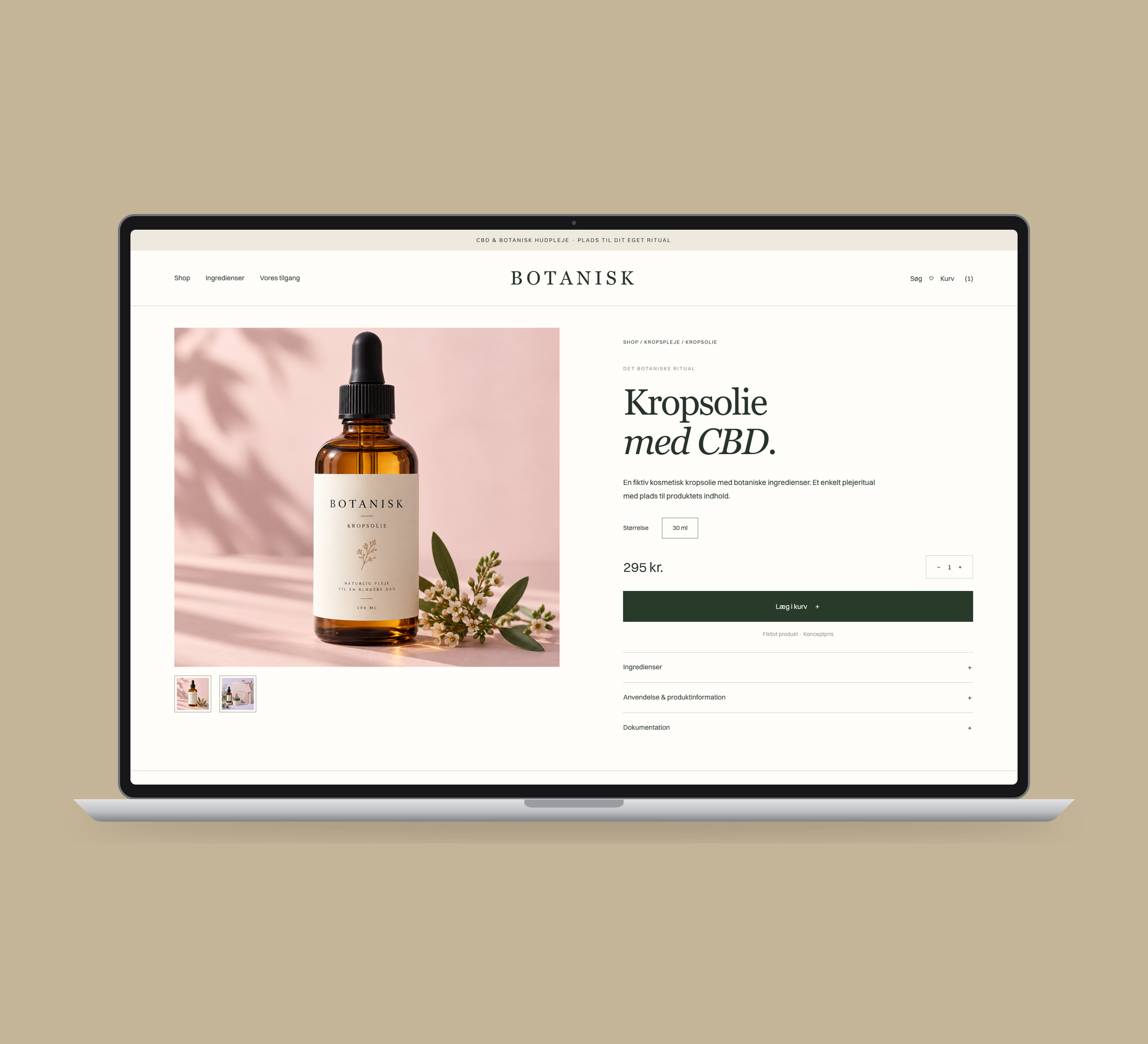 Botanisk: produkt vist lige forfra på laptop på en ensfarvet studiobaggrund.