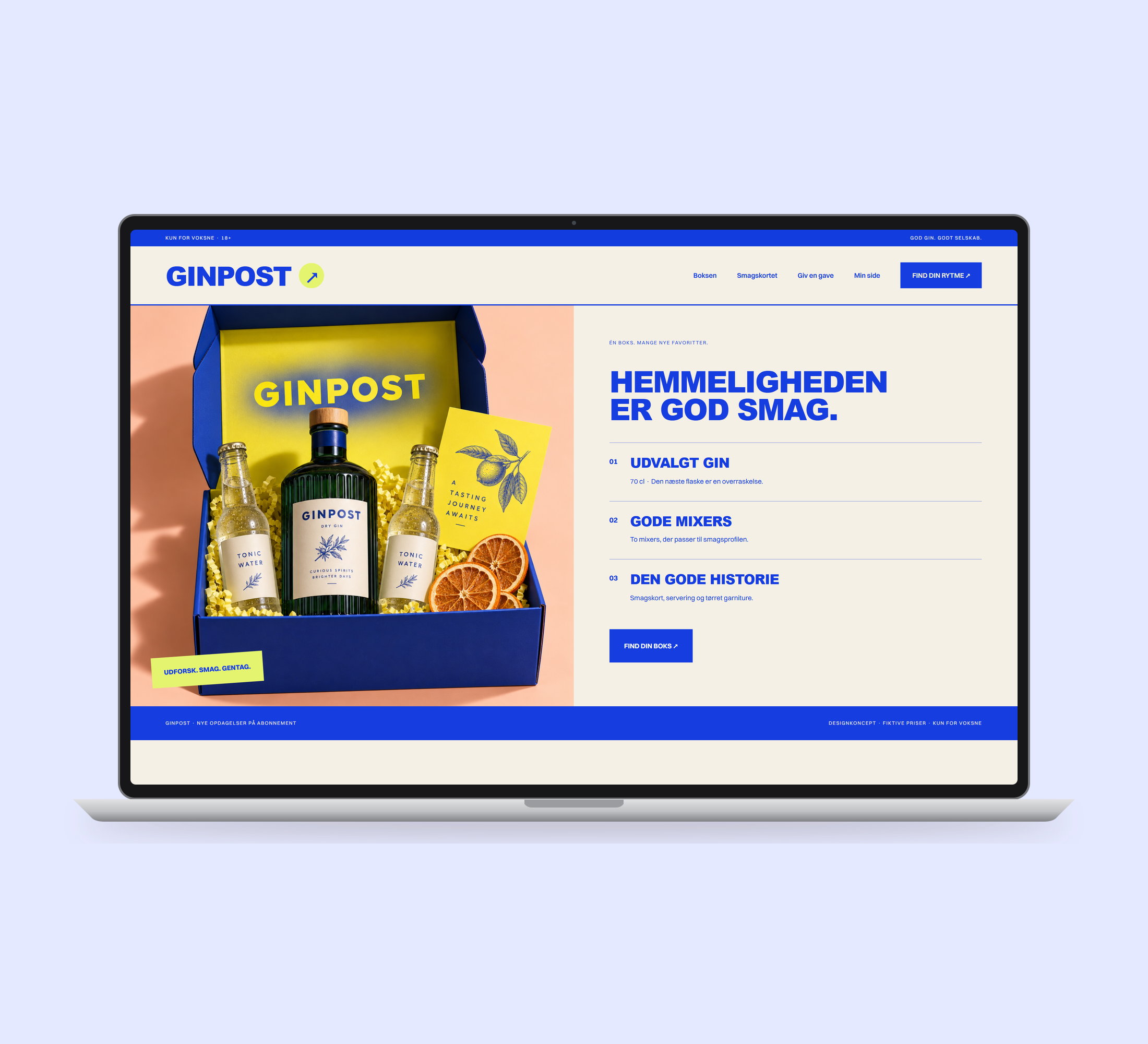 Ginpost: boksen vist lige forfra på laptop på en ensfarvet studiobaggrund.