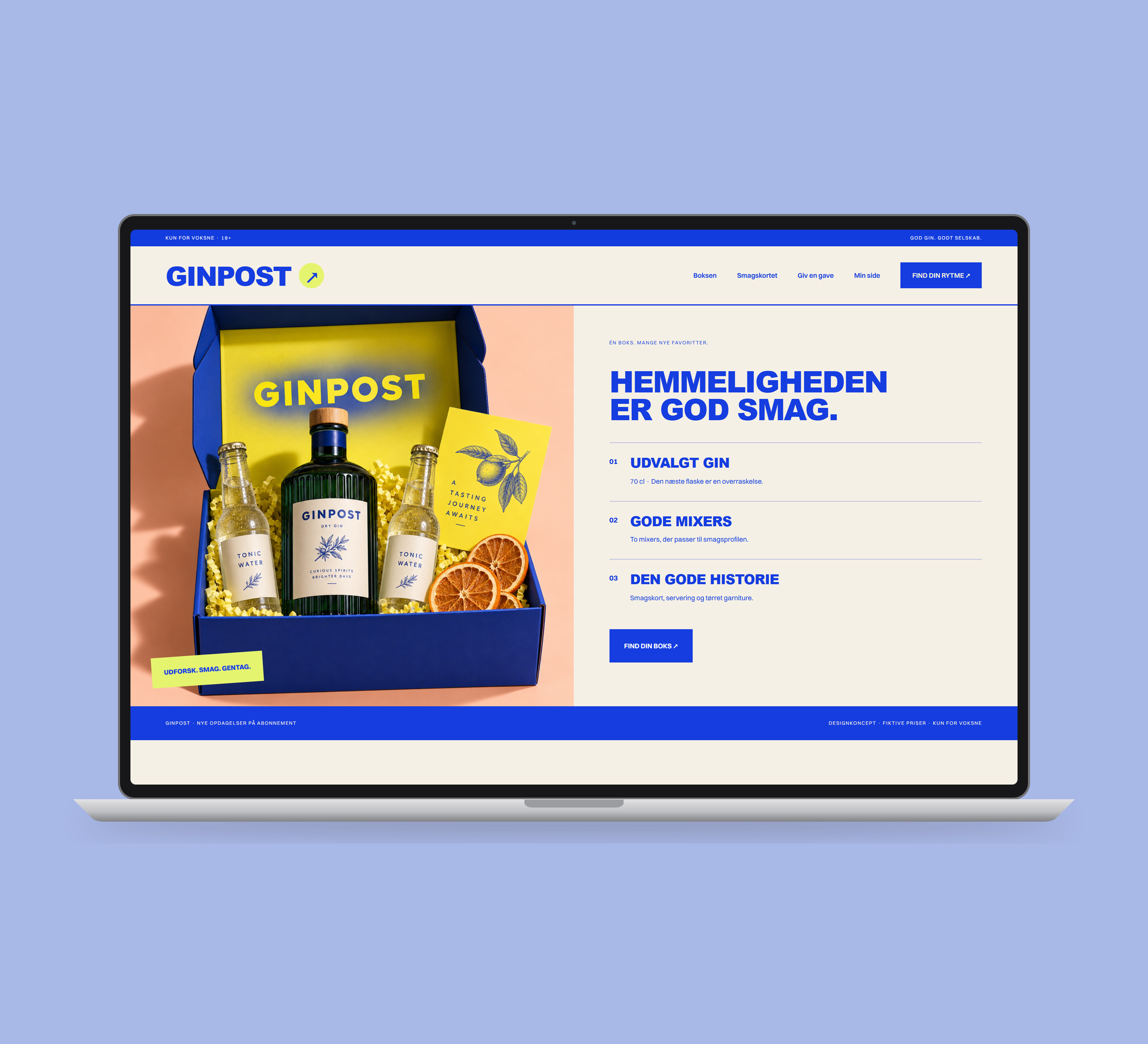 Ginpost: boksen vist lige forfra på laptop på en ensfarvet studiobaggrund.