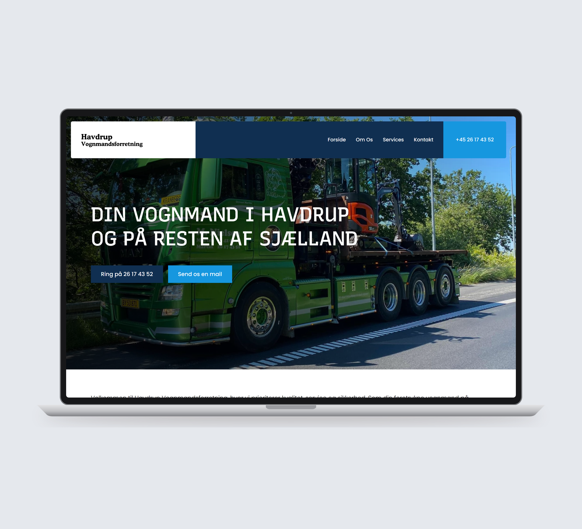 Havdrup Vognmandsforretning: forside vist lige forfra på laptop på en ensfarvet studiobaggrund.