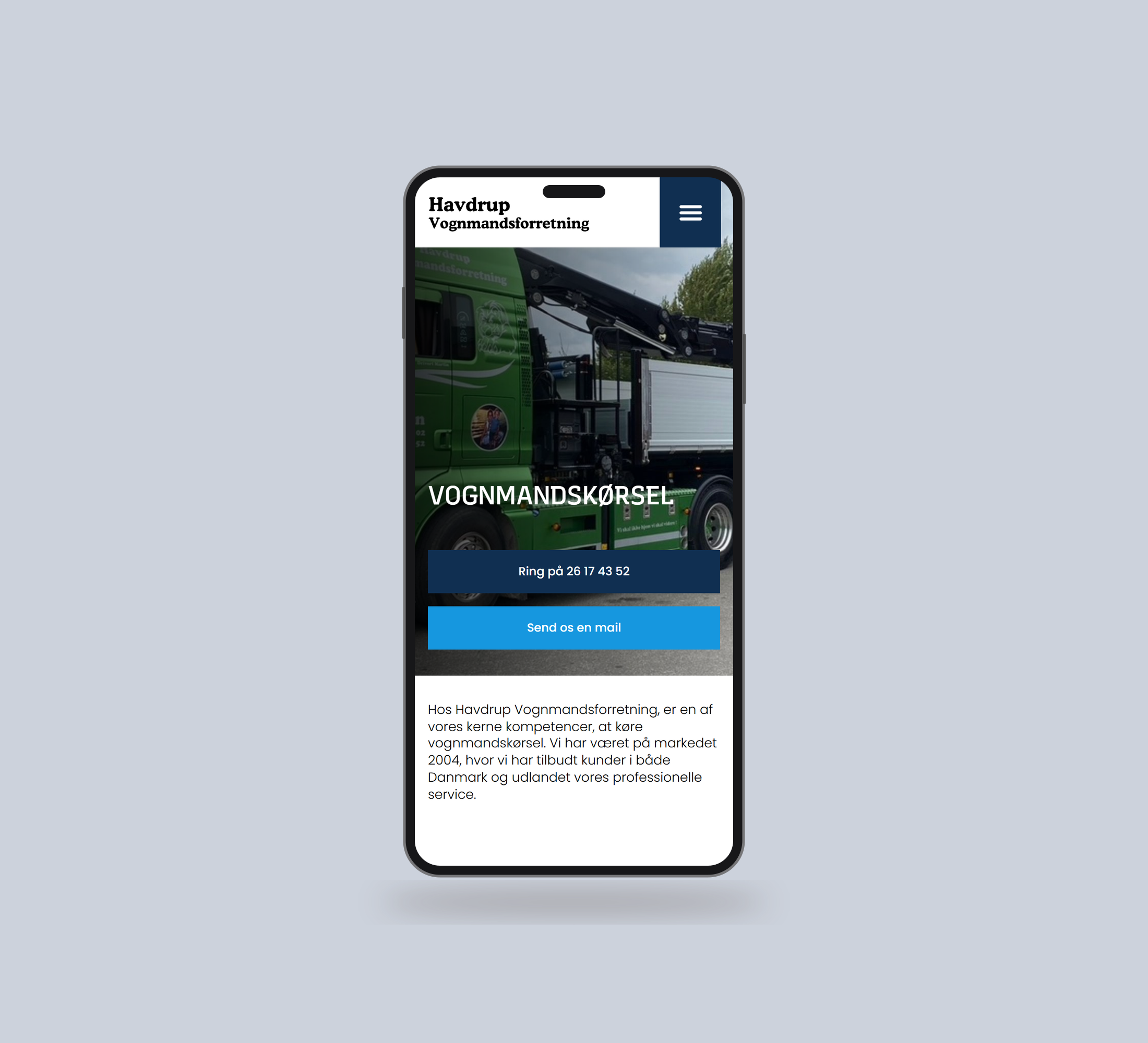 Havdrup Vognmandsforretning: vognmandskørsel vist lige forfra på mobil på en ensfarvet studiobaggrund.