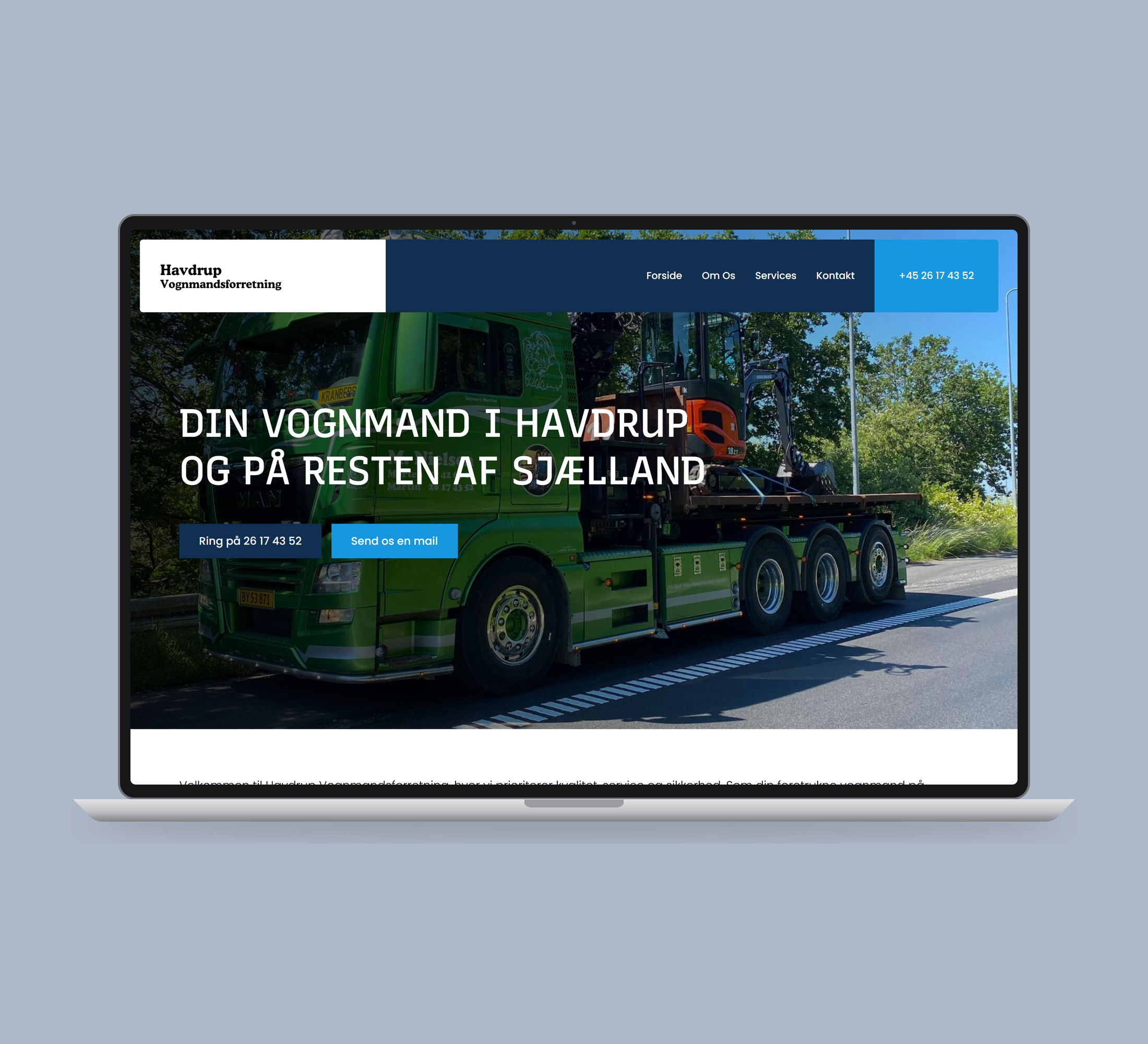Havdrup Vognmandsforretning: forside vist lige forfra på laptop på en ensfarvet studiobaggrund.